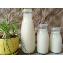 Haonai 200/250/500ml sealed glass milk bottles with the plastic lid